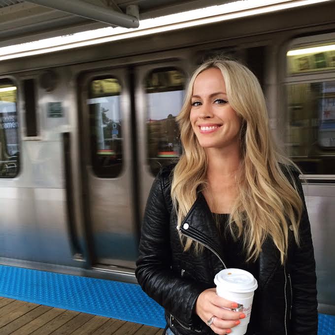 Amy Hood standing near the subway train in Chicago