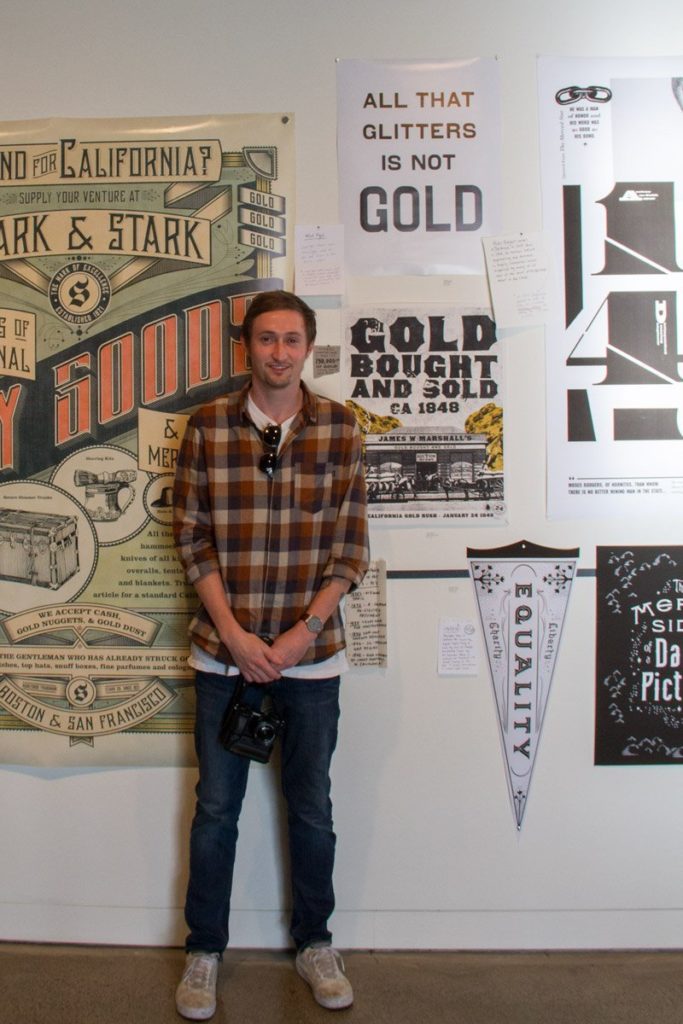 Andy Boice with his poster at Eureka Group Show