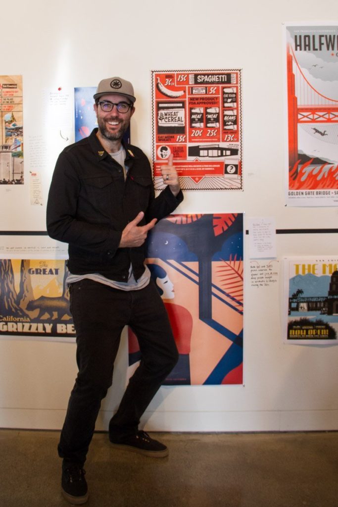 Leon Ingram with his poster at Eureka Group Show
