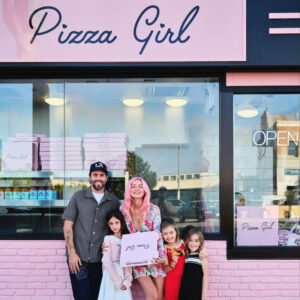 Pizza Girl Inc shop by Caroline D'Amore with her family standing out front