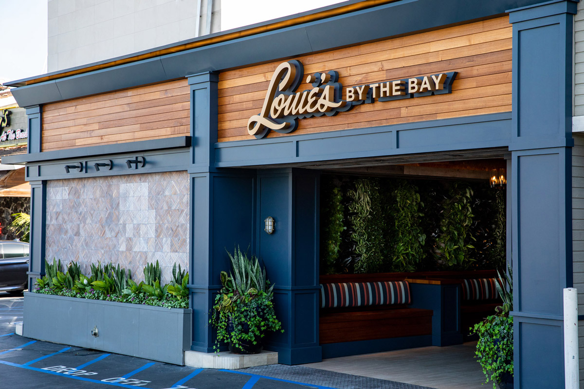 Louie's By The Bay Restaurant facade sign