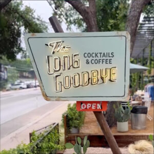 The Long Goodbye cocktails and coffee outdoor sign