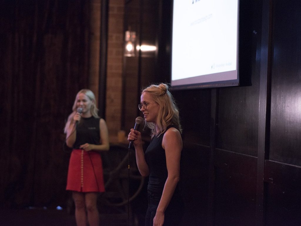 Amy and Jen Hood speaking at the AIGA Charlotte conference