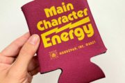 Main Character Energy Koozie by Hoodzpah