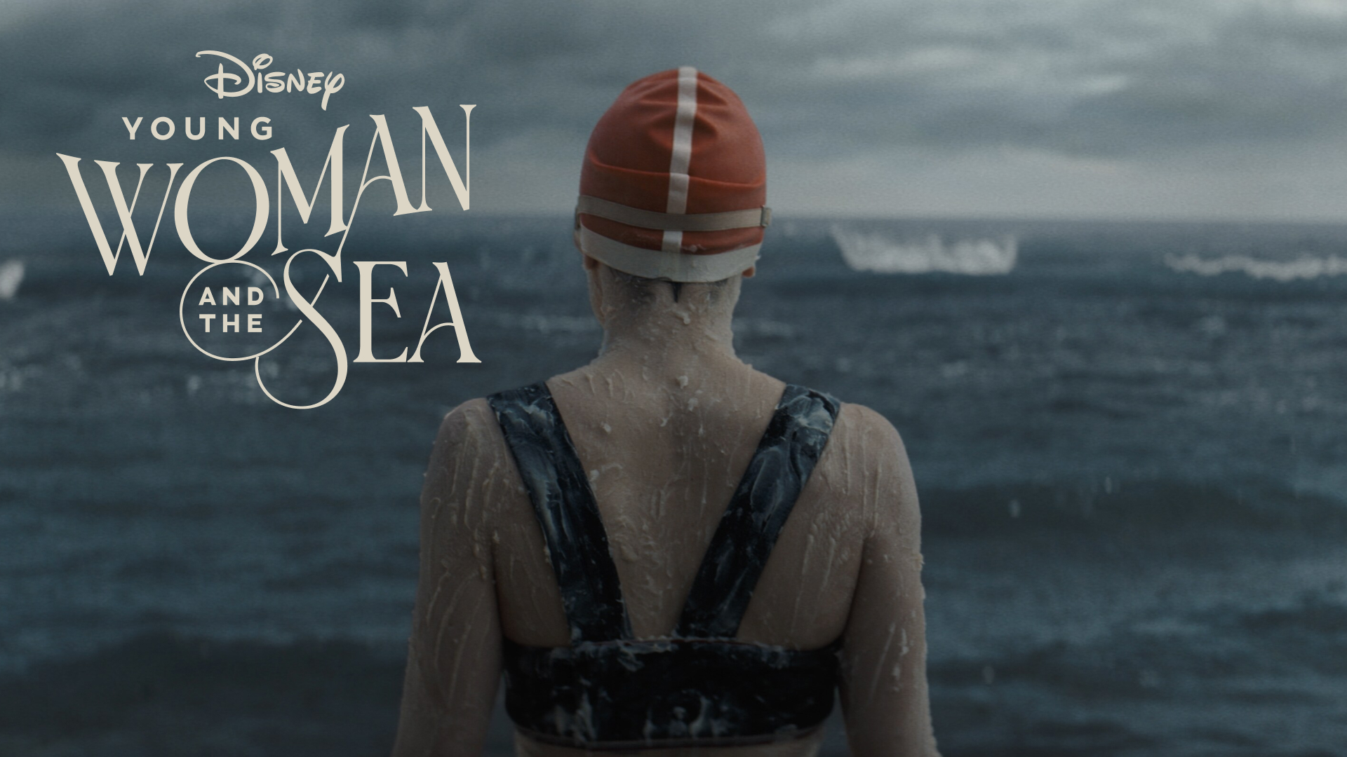 Young Woman and the Sea title treatment concept over a photo of a woman looking at the sea in a swimming cap and 1920s swimming costume.