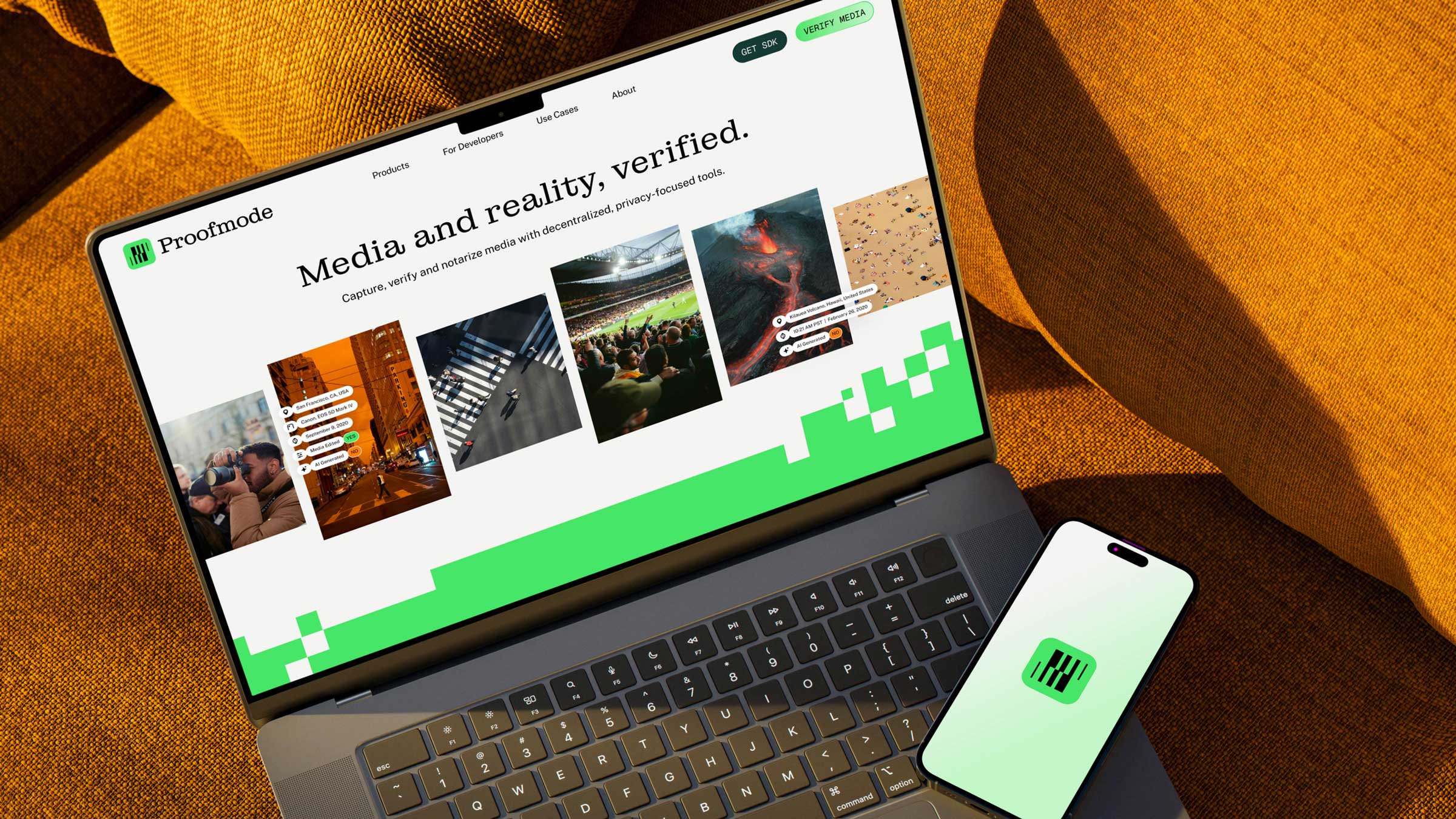 Proofmode rebrand with logo and website on a laptop